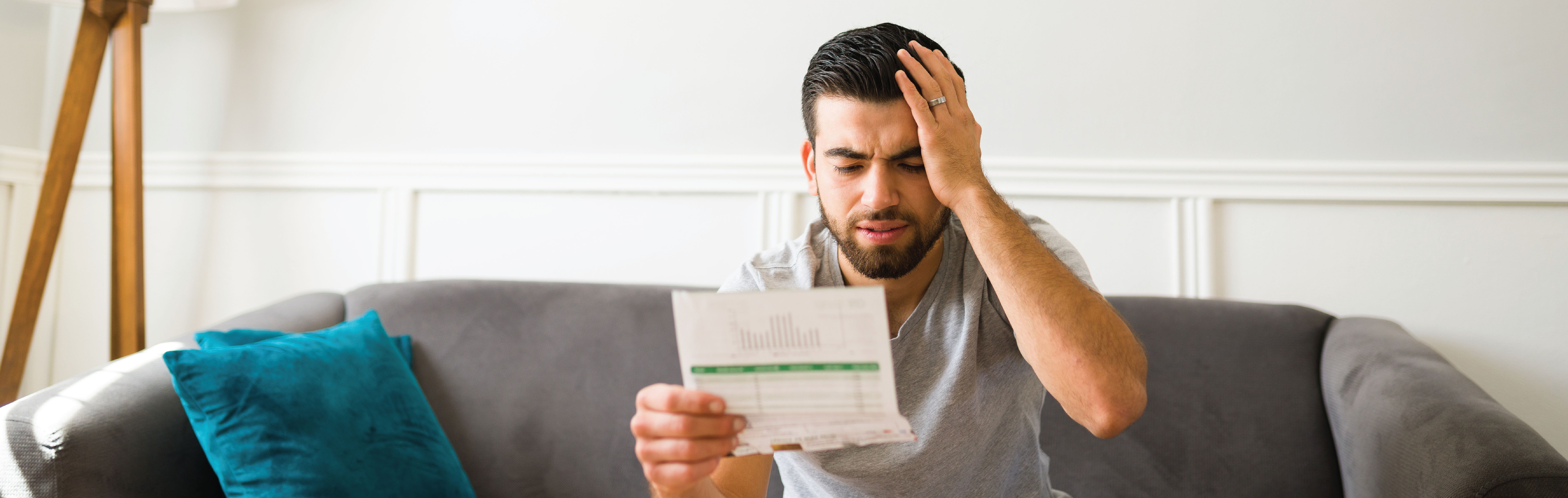 Man looking hopelessly at bibll