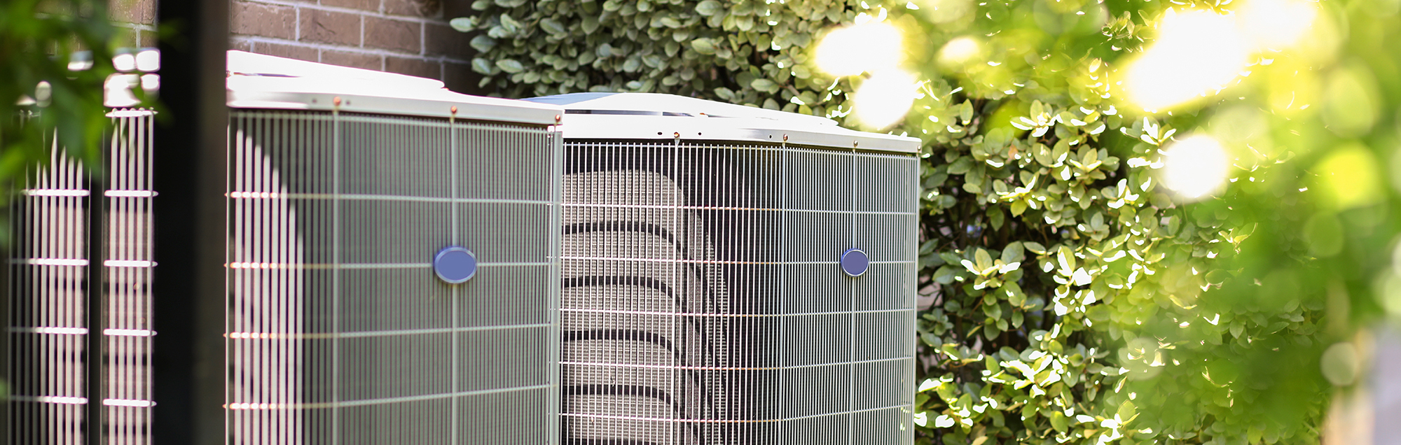 HVAC system outside by side of a home